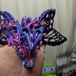 Three d printed wolf butterfly dragon