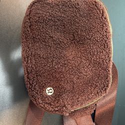 New never used Lululemon brown fuzzy belt bag 