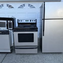 Refrigerator, Electric Stove, Dishwasher, Over The Range Microwave 