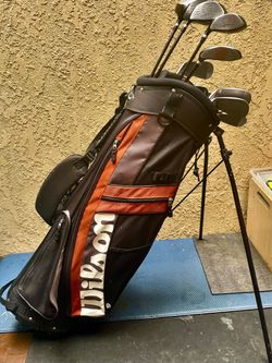 Complete man’s golf club for right hand (Wilson driver ,wood,full iron set putter and golf bag)good condition
