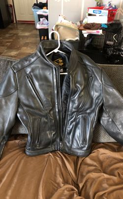 Practically new motorcycle leather coat. Made in USA size 44