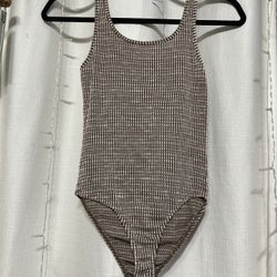 Brown and white bodysuit