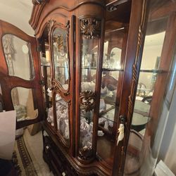 China Cabinet With Crystal Figurines 