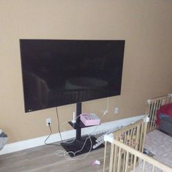  Samsung 65 Inch Televison With Stand Included.