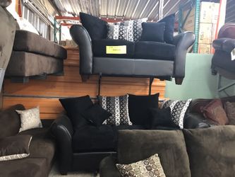 Black sofa and love seat