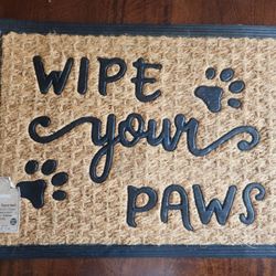 Cute Scraper Doormat 18 inch X 24 inch New but small tear in the back of mat.