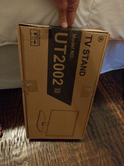 Brand new in box TV swivel stand UT2002 for large TVs up to 60 in
