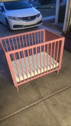 Pink baby bed