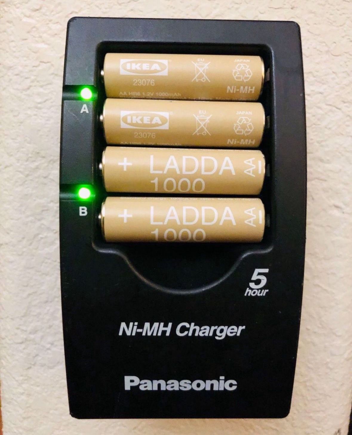 4 IKEA LADDA AA size Rechargeable batteries with Panasonic Battery charger , in good shape like new