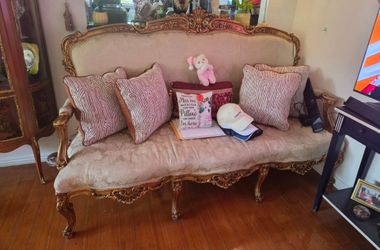 French style sofa  a lot of carving all over. And gold leaves color