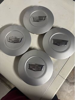 2015-2020 Escalade center caps. Set of 4