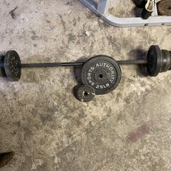 Straight Bar And 100lbs Of Weight 