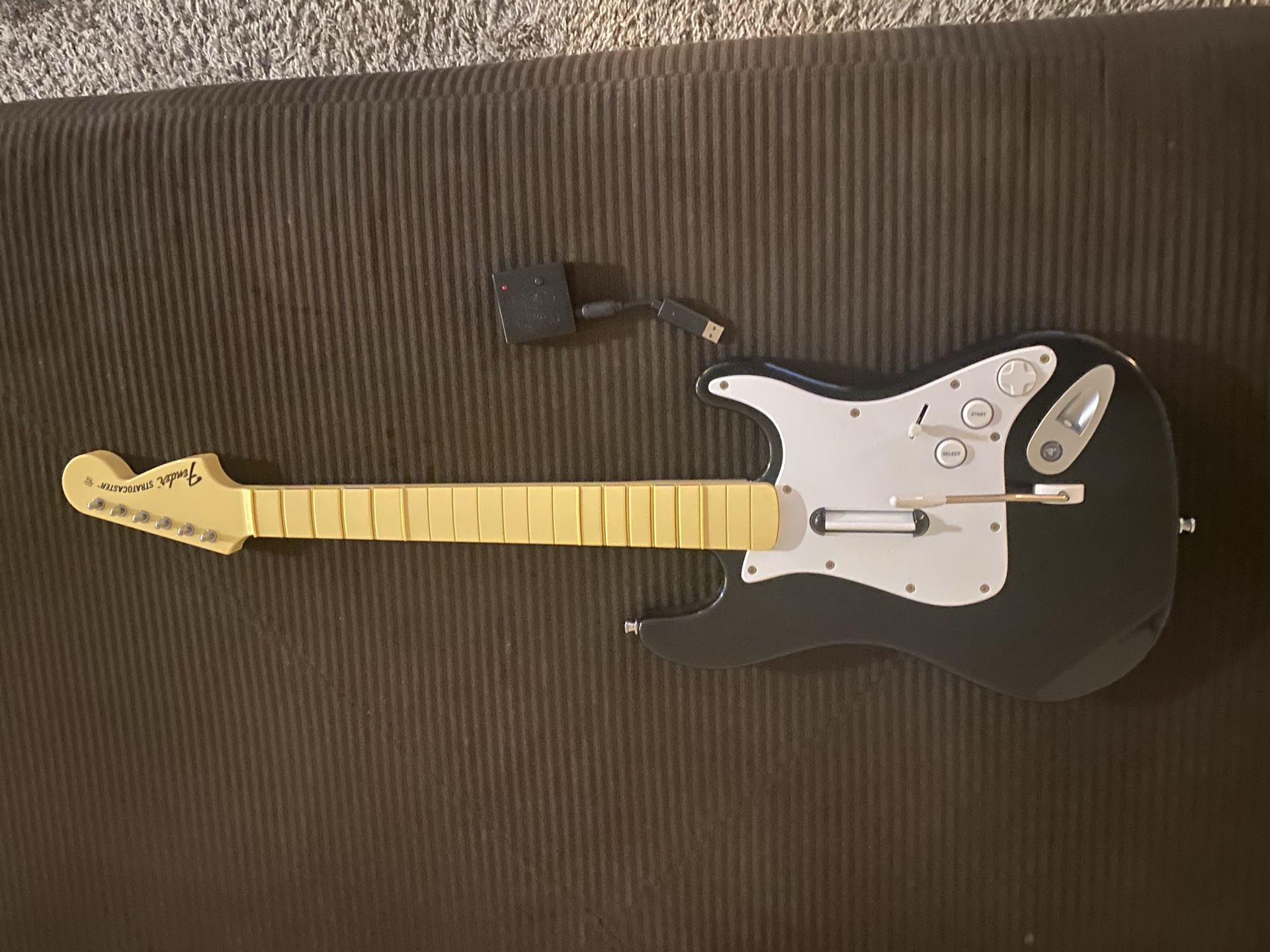 Rockband guitar w/dongle (PS3) and Rockband and compatible Guitar hero games.