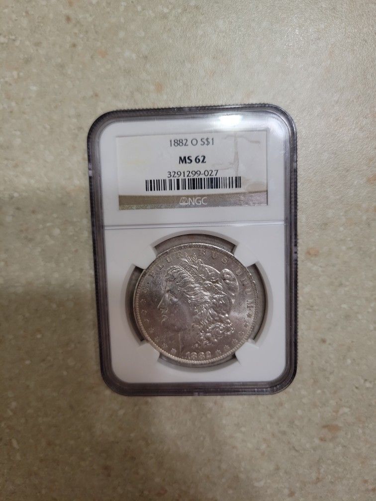 1882 O Morgan Silver Dollar . Graded