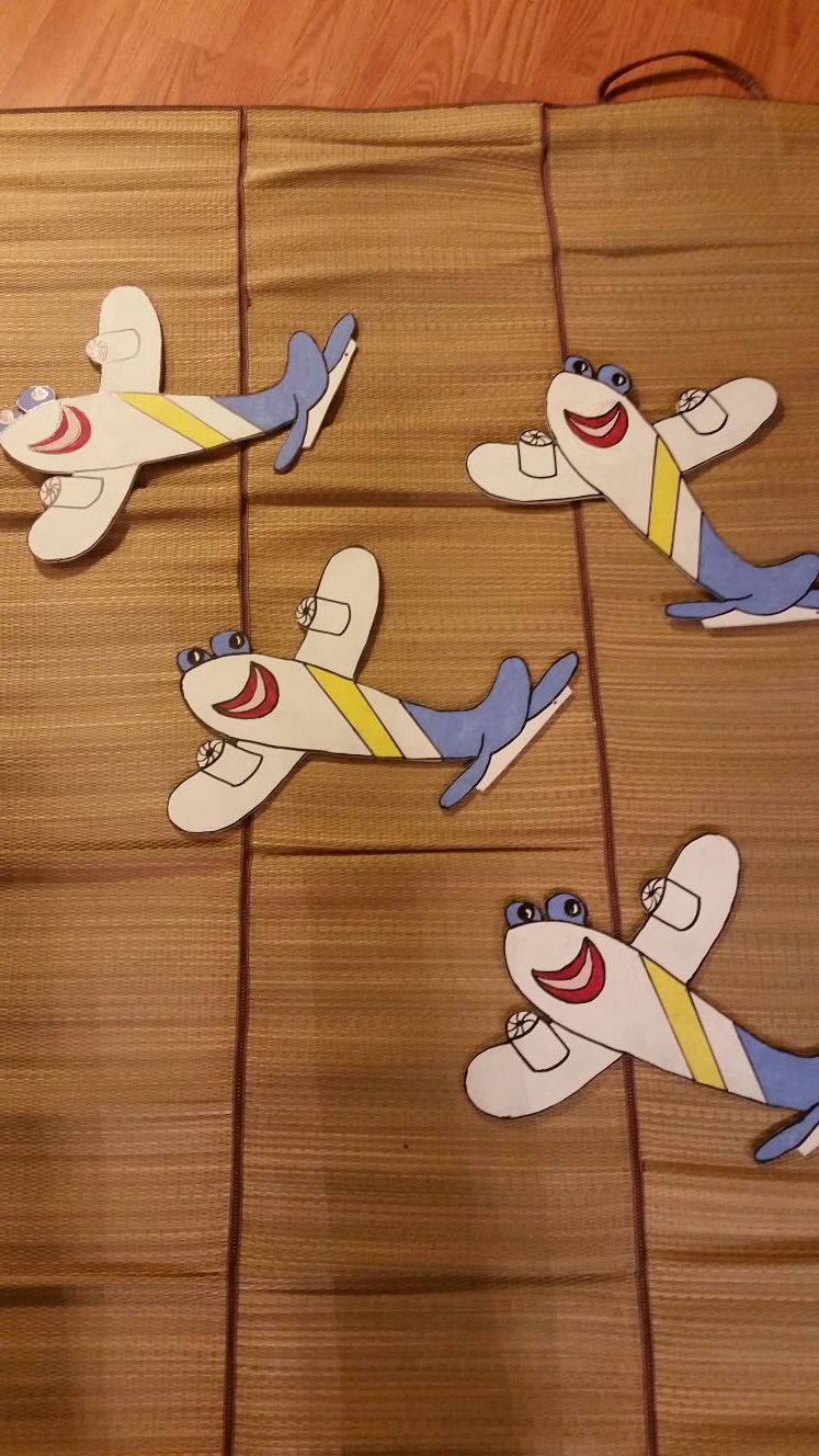 4 wooden airplanes handpainted