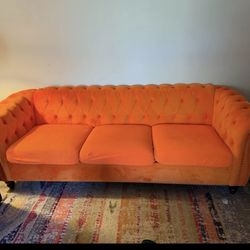 Bright Orange Velvet Couch