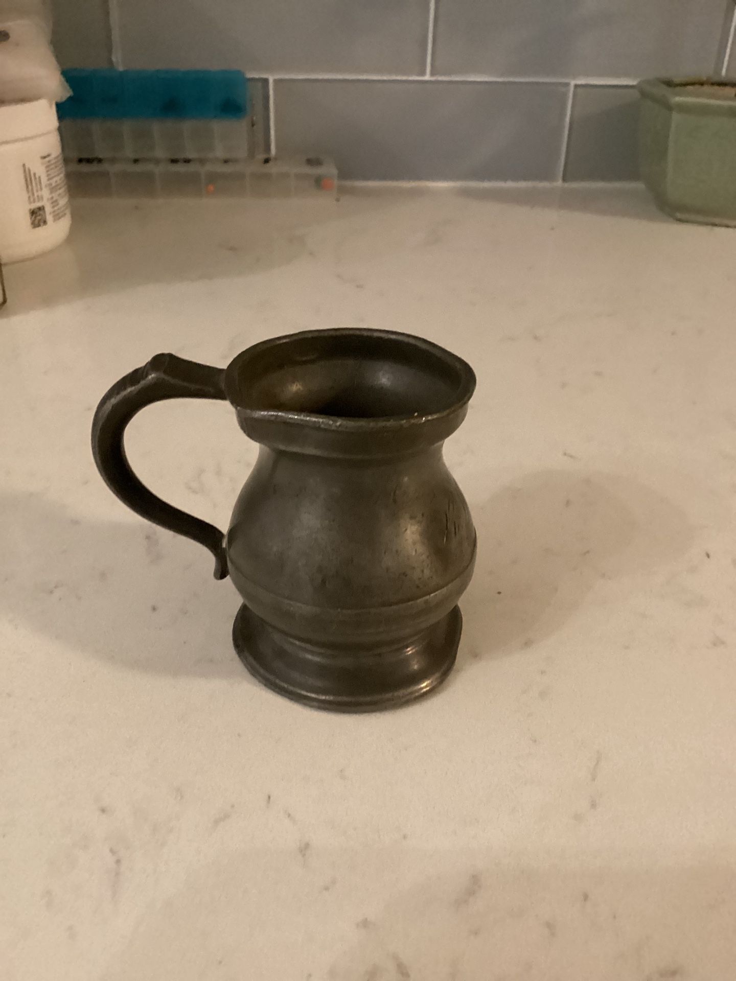 Antique pewter pint measure