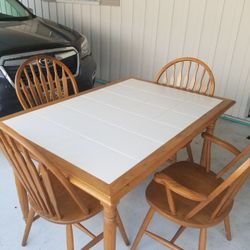Solid Wood Table With Cream Tile Top And 4 Solid Wood Chairs.  Very Good Condition!