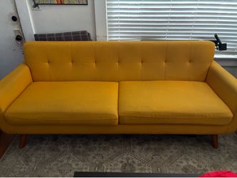 Yellow vintage looking couch
