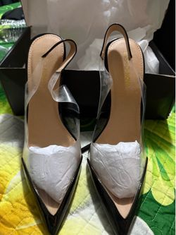 Black patent leather mules with clear heel