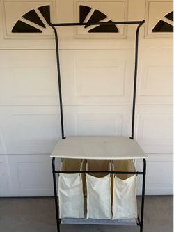 Rolling laundry sorter with iron board and rack