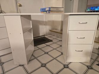 White wooden writing desk with a compact study/office layout