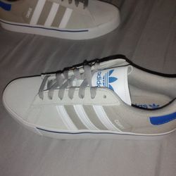 Adidas... Brand New .. Size 10