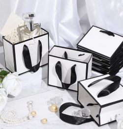 50 pcs small black and white gift bags 4.75x2.25x4 new in package