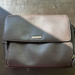 Super cute brown purse.