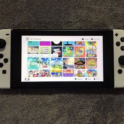 NINTENDO SWITCH With 125 SWITCH GAMES 