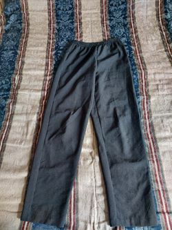 Black designer pants with small white stripes