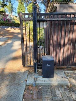 Heavy electric gate not moving smoothly? Full system check and motor adjustment