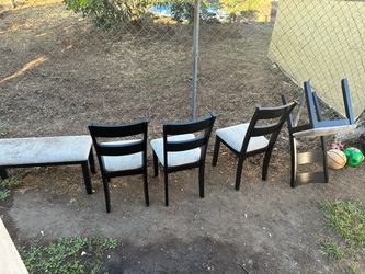 Table 4 chairs and a bench