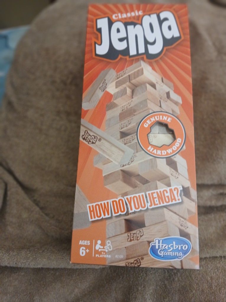 Classic Jenga...genuine hardwood blocks. Hours of fun with friends..Brand New...box never opened