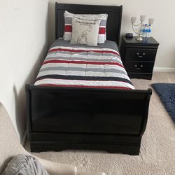 One Twin Bed With One nightstand 