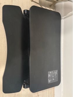 Height-adjustable standing desk converter