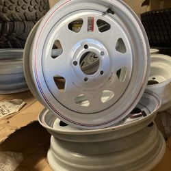 One trailer tire rim 15 inches 5 on 5 for Carson anbig tag trailer $55 