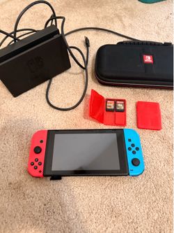 Nintendo Switch w/ Zelda Games