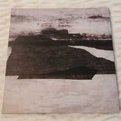 A Piece of Abstract Art on a Framed Canvas, Prop