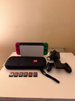 Nintendo Switch OLED White Dock Bundle with 6 Games & Carrying Case