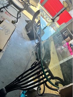 Long counter height glass table for display