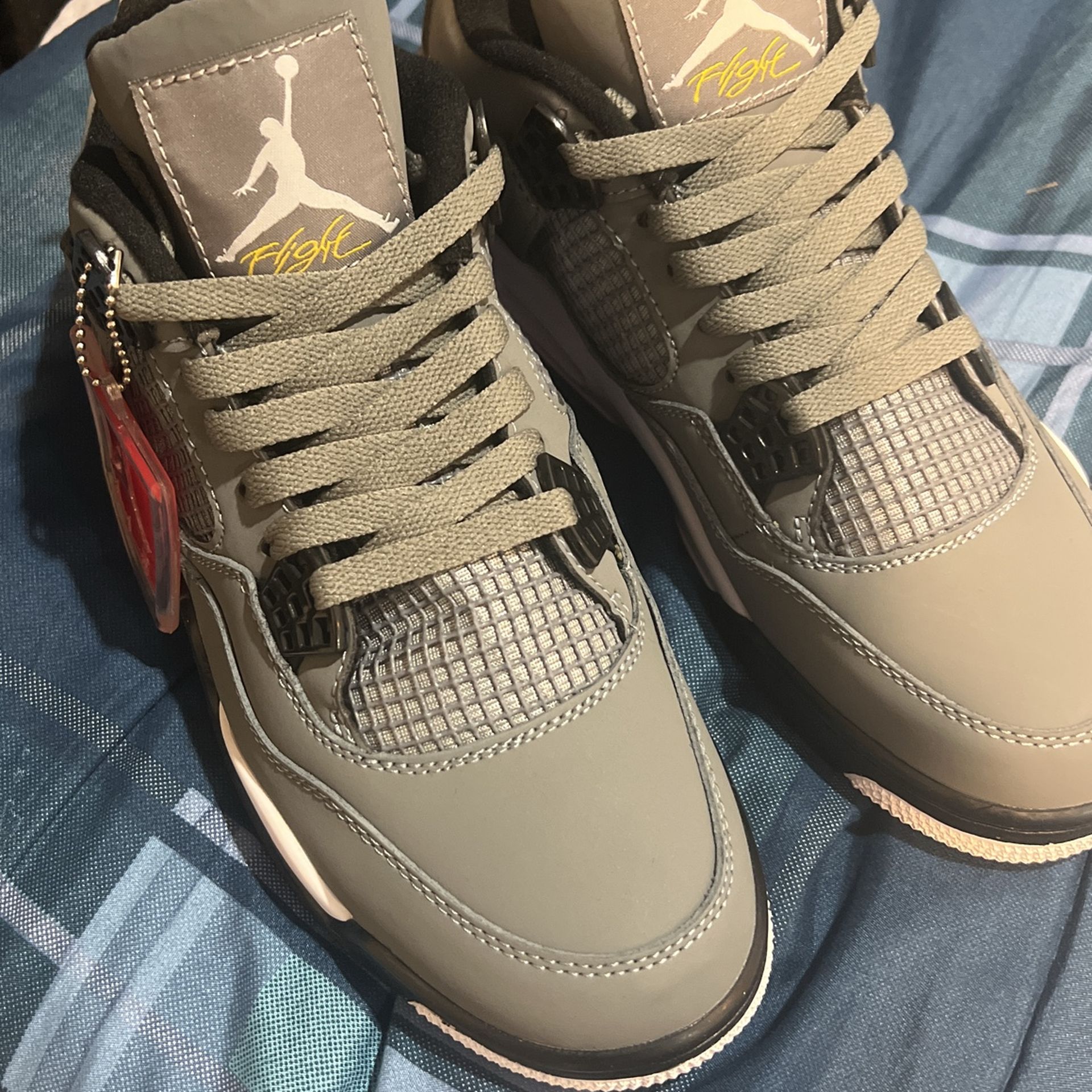Jordan’s 4 Retro Grey Men’s Shoes