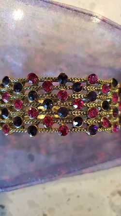 Beautiful Yellow Gold Bangle Bracelet with Purple and Pink Bling