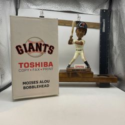 Moises Alou San Francisco Giants bobblehead. It was a stadium giveaway (SGA) item sponsored by Toshiba during the 2006 baseball season