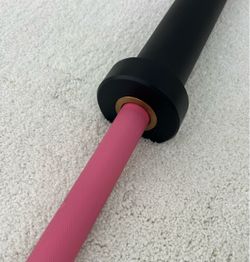 6 foot and a half pink Olympic bar