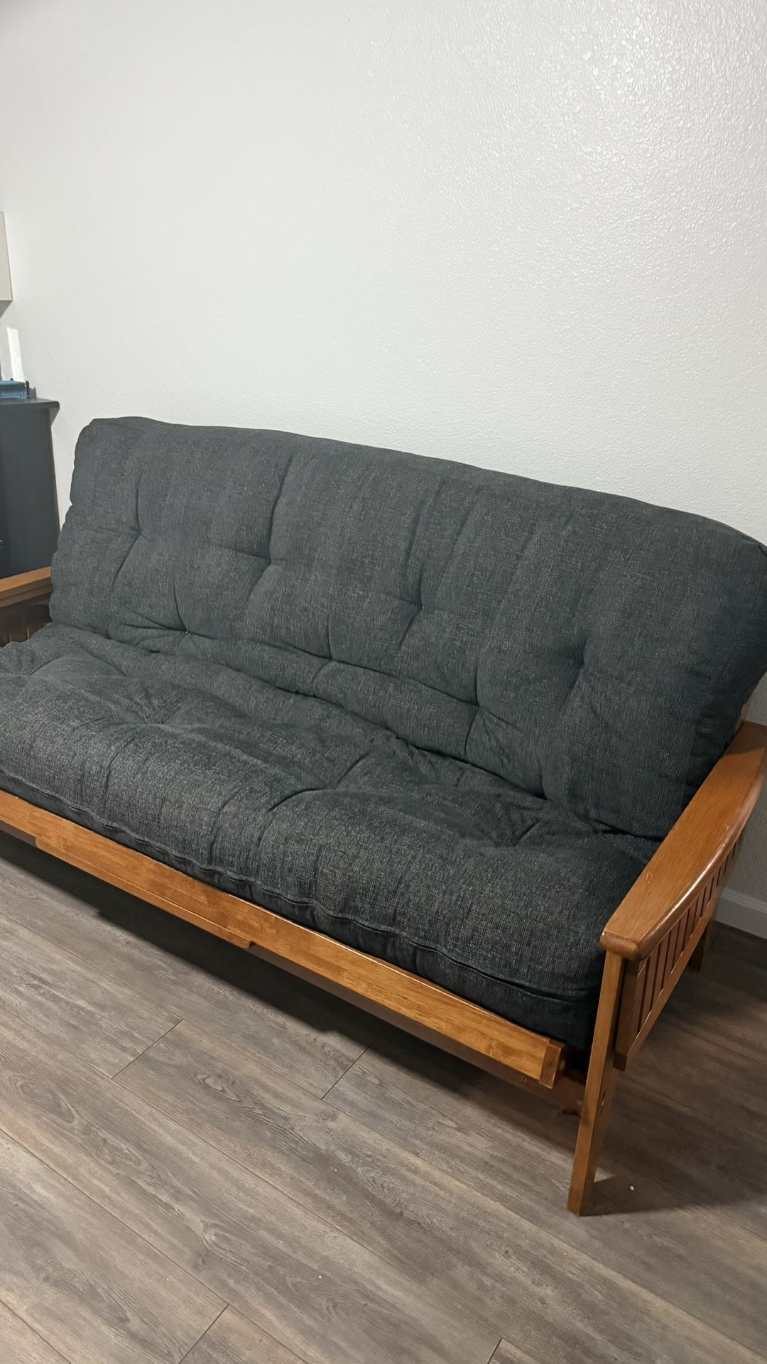 wooden sofa bed with full size mattress