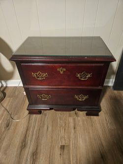 Vintage night stand with glass canvas
