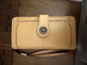 Light yellow leather wallet with wristlet