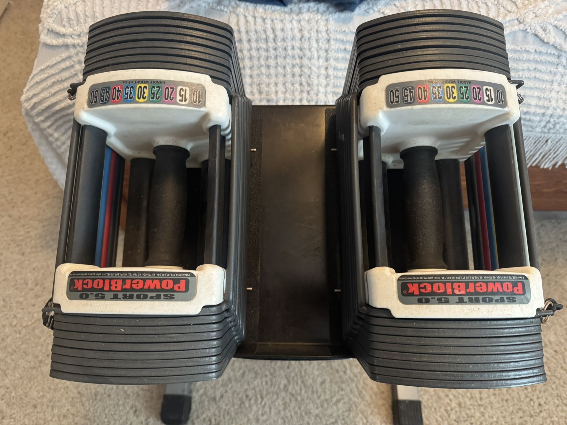 Powerblock Sport 5.0 adjustable dumbbell pair with stand