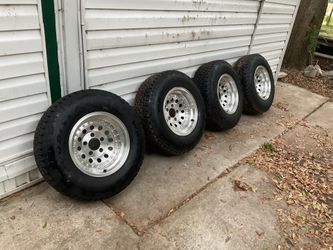 4 New tires Goodyear Ranger with American racing rims.  235 75 R15 $800.00